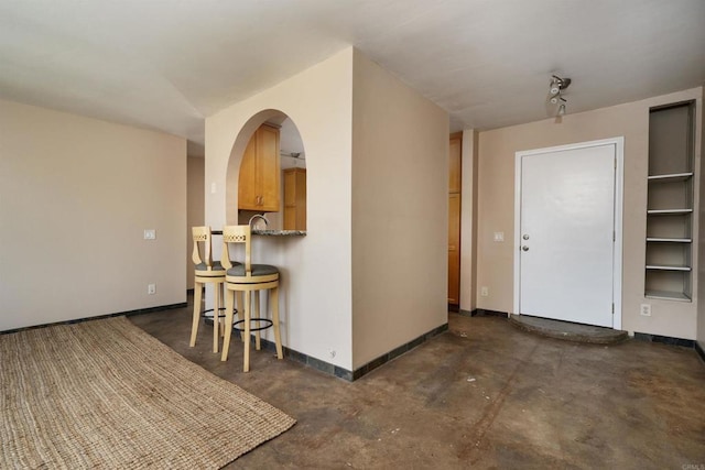 5155 W Point Loma Blvd Unit 9, San Diego, CA 92107 - foyer featuring concrete floors and baseboards