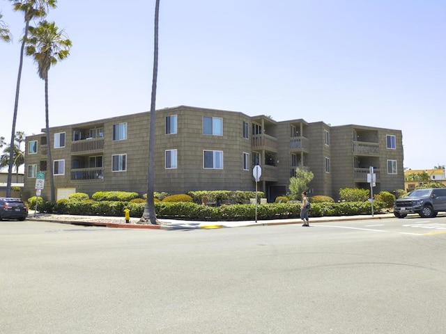5155 W Point Loma Blvd Unit 9, San Diego, CA 92107 - view of apartment building / complex featuring uncovered parking