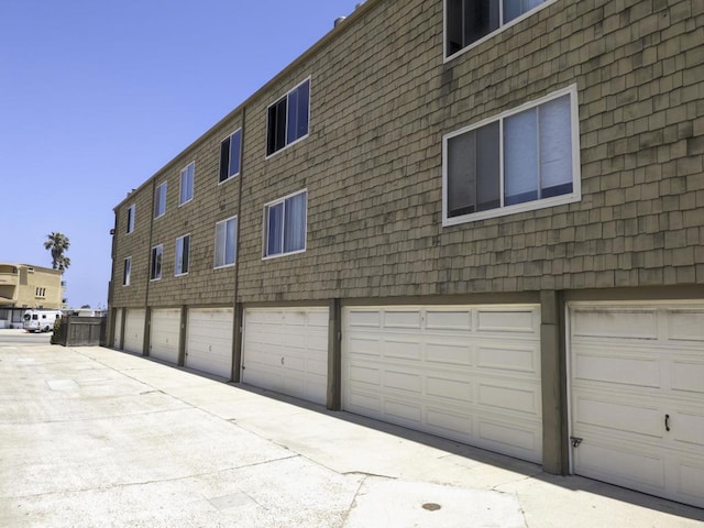 5155 W Point Loma Blvd Unit 9, San Diego, CA 92107 - view of property featuring a garage