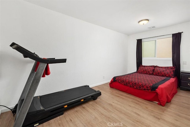 3142 Midway Dr Unit 312, San Diego, CA 92110 - exercise room with wood finished floors and baseboards