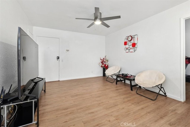 3142 Midway Dr Unit 312, San Diego, CA 92110 - living area featuring ceiling fan and light wood-style flooring