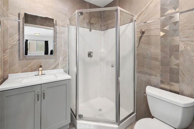 3142 Midway Dr Unit 312, San Diego, CA 92110 - full bath featuring tile walls, a shower stall, and vanity