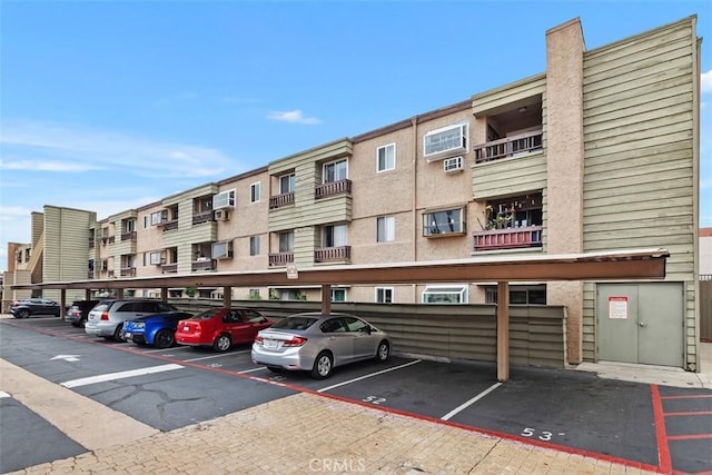 3142 Midway Dr Unit 312, San Diego, CA 92110 - view of apartment building / complex with covered parking