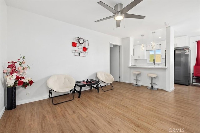 3142 Midway Dr Unit 312, San Diego, CA 92110 - sitting room featuring light wood-style flooring and ceiling fan