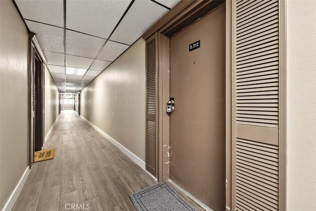 3142 Midway Dr Unit 312, San Diego, CA 92110 - hall featuring wood finished floors and a drop ceiling