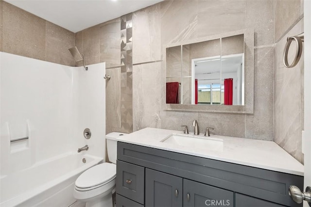 3142 Midway Dr Unit 312, San Diego, CA 92110 - full bathroom featuring tile walls, vanity, and bathtub / shower combination