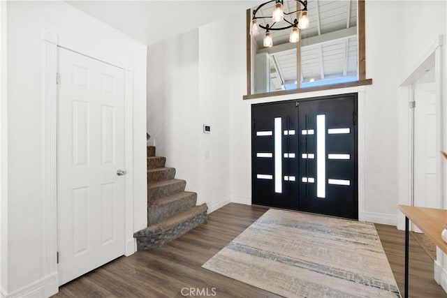 2040 Cape Cod Ct, Claremont, CA 91711 - entrance foyer with a chandelier, wood finished floors, and stairs