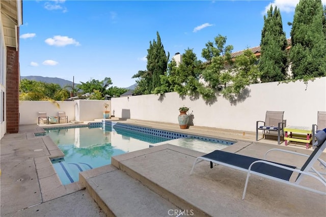 2040 Cape Cod Ct, Claremont, CA 91711 - view of pool with a fenced backyard, a patio, and a mountain view