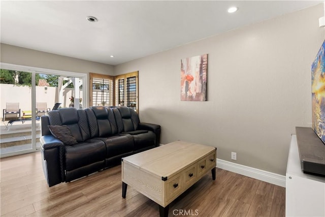 2040 Cape Cod Ct, Claremont, CA 91711 - living area featuring light wood finished floors and recessed lighting