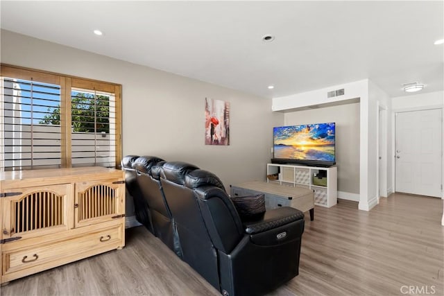 2040 Cape Cod Ct, Claremont, CA 91711 - living room with wood finished floors and recessed lighting