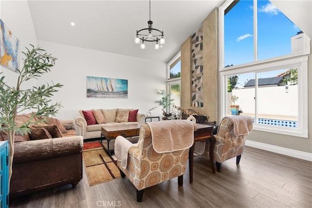 2040 Cape Cod Ct, Claremont, CA 91711 - living area featuring a chandelier, wood finished floors, and high vaulted ceiling