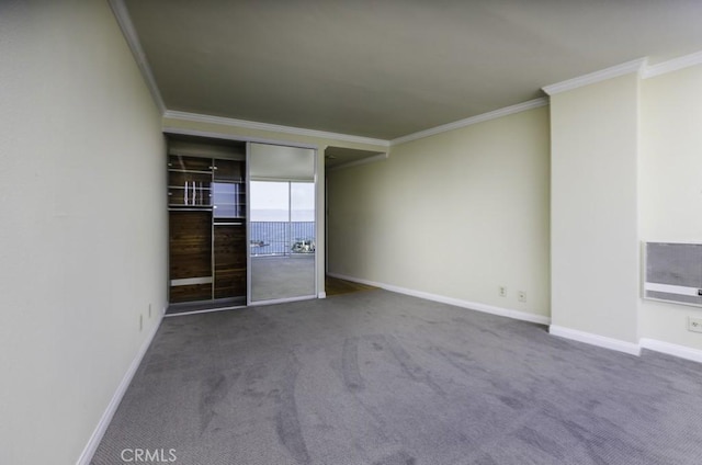 700 E Ocean Blvd Unit 2606, Long Beach, CA 90802 - unfurnished bedroom with ornamental molding and carpet flooring