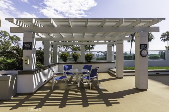 700 E Ocean Blvd Unit 2606, Long Beach, CA 90802 - view of patio featuring a pergola and outdoor dining area