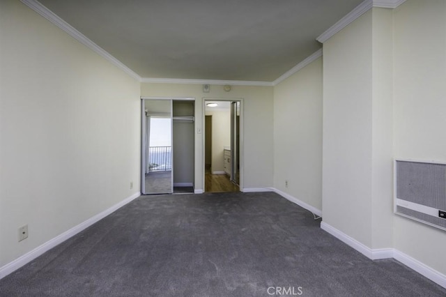 700 E Ocean Blvd Unit 2606, Long Beach, CA 90802 - unfurnished room featuring heating unit, crown molding, and carpet floors