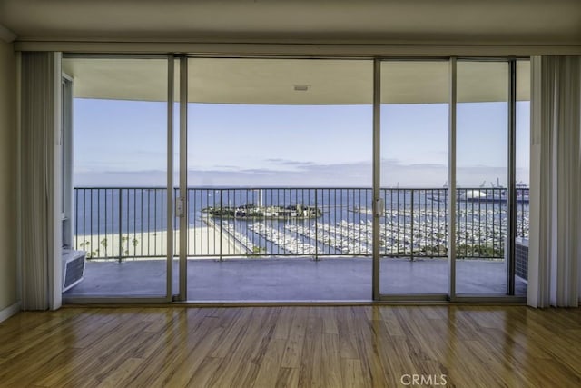 700 E Ocean Blvd Unit 2606, Long Beach, CA 90802 - unfurnished sunroom with a water view