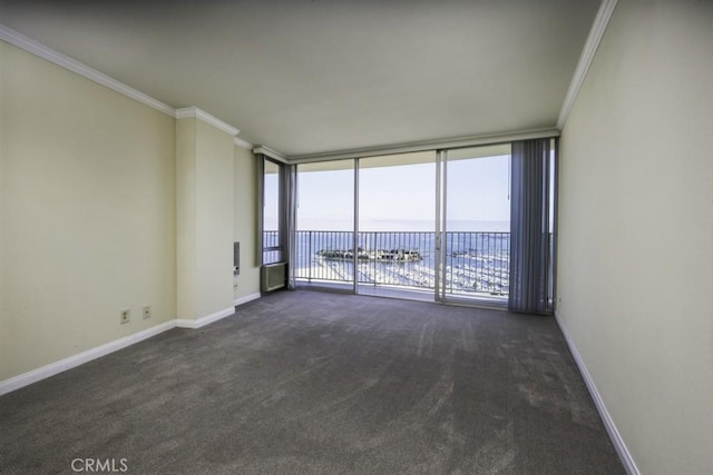 700 E Ocean Blvd Unit 2606, Long Beach, CA 90802 - unfurnished room featuring ornamental molding, dark colored carpet, a wall of windows, and a water view