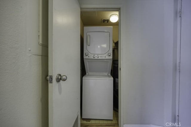 700 E Ocean Blvd Unit 2606, Long Beach, CA 90802 - laundry area featuring estacked washer and dryer