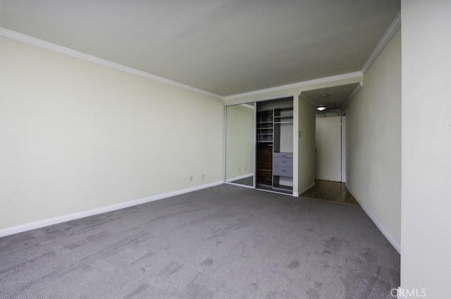 700 E Ocean Blvd Unit 2606, Long Beach, CA 90802 - unfurnished bedroom with crown molding, carpet flooring, and a closet