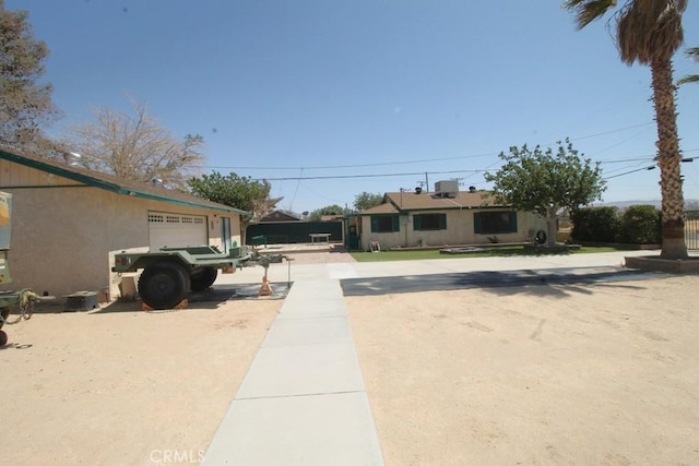 38103 Dividing Line St, Yermo, CA 92398 - view of yard featuring a garage