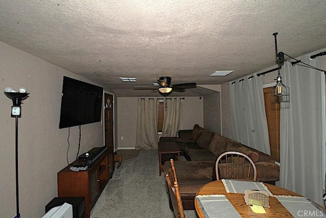 38103 Dividing Line St, Yermo, CA 92398 - carpeted living room with a textured ceiling, ceiling fan, and a textured wall