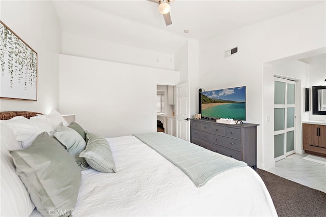 36 Via Madera, Rancho Santa Margarita, CA 92688 - bedroom with marble look tiles, ceiling fan, and a towering ceiling