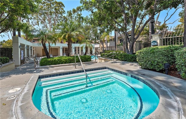 36 Via Madera, Rancho Santa Margarita, CA 92688 - community pool featuring a community hot tub, a residential view, and a patio area