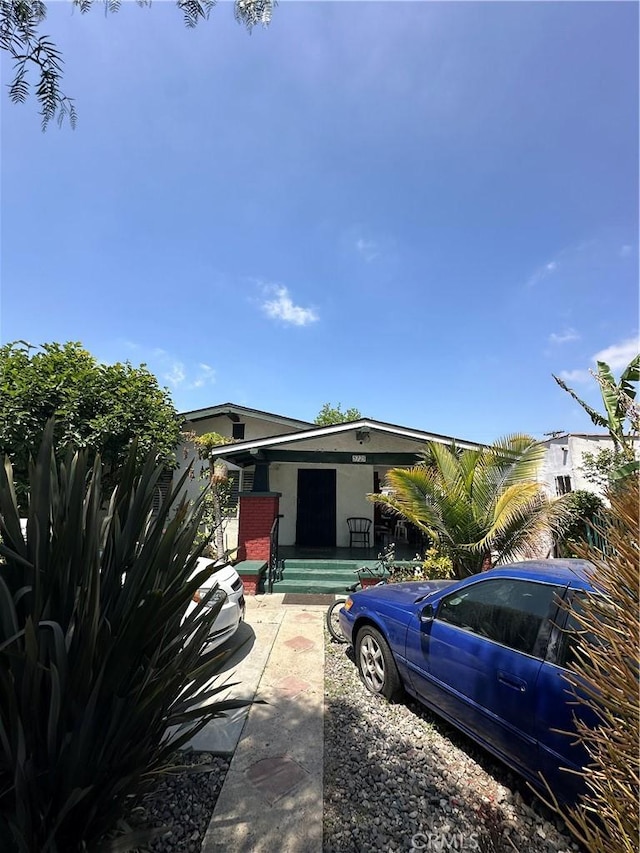 5725 5th Ave, Los Angeles, CA 90043 - view of front of home with stucco siding and covered porch