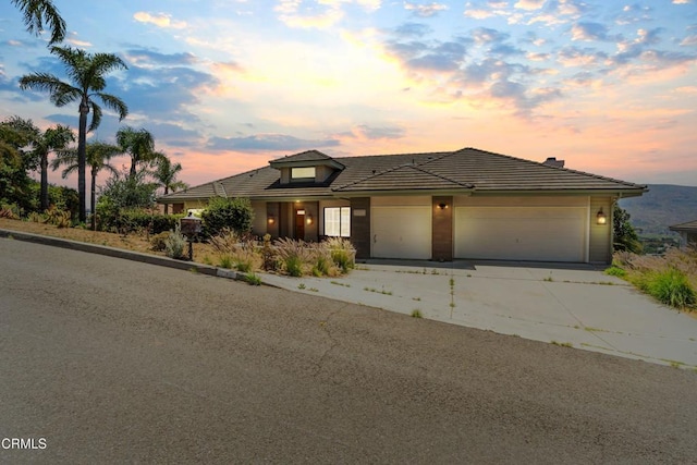 800 Manor Ridge Rd, Santa Paula, CA 93060 - view of front of property featuring driveway, an attached garage, and a tile roof