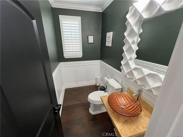 4866 Stoneglen Ave, Fontana, CA 92336 - bathroom with wood finished floors, crown molding, wainscoting, and a decorative wall
