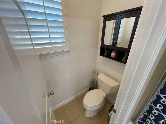 4866 Stoneglen Ave, Fontana, CA 92336 - bathroom with tile patterned flooring and toilet