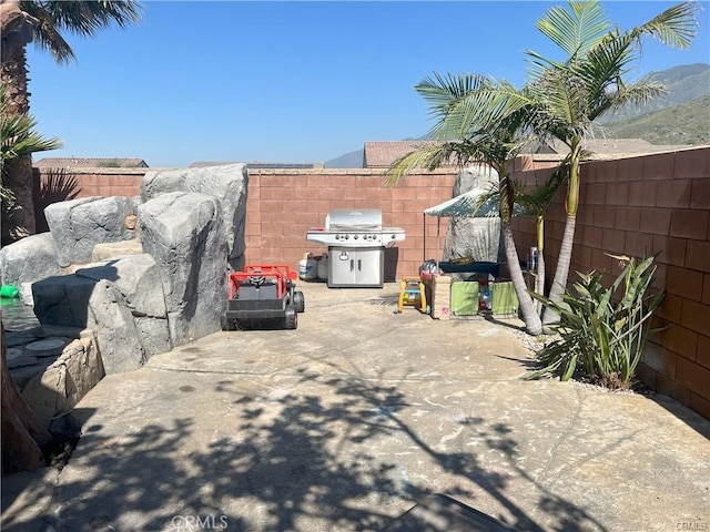 4866 Stoneglen Ave, Fontana, CA 92336 - view of patio / terrace featuring a grill