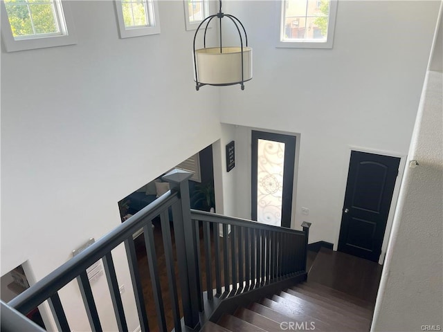 4866 Stoneglen Ave, Fontana, CA 92336 - staircase featuring wood finished floors