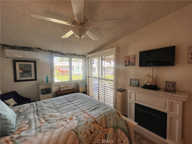 1271 Kenwood Rd Unit M7-J, Seal Beach, CA 90740 - bedroom with a wall mounted AC, a textured ceiling, lofted ceiling, access to exterior, and a ceiling fan