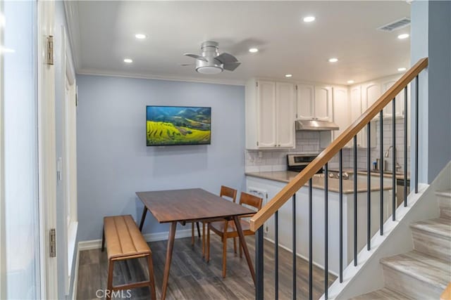 1845 Anaheim Ave Unit 27, Costa Mesa, CA 92627 - stairway featuring recessed lighting, wood finished floors, ornamental molding, and ceiling fan