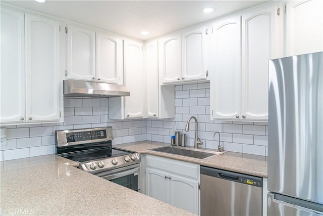 1845 Anaheim Ave Unit 27, Costa Mesa, CA 92627 - kitchen with stainless steel appliances, under cabinet range hood, white cabinets, light countertops, and recessed lighting