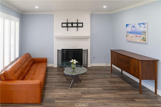 1845 Anaheim Ave Unit 27, Costa Mesa, CA 92627 - living area with wood finished floors, recessed lighting, ornamental molding, and a fireplace