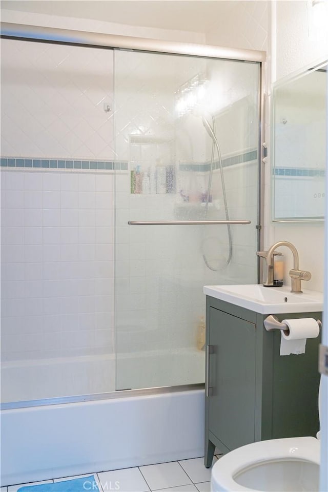 1845 Anaheim Ave Unit 7D, Costa Mesa, CA 92627 - bathroom featuring combined bath / shower with glass door, tile patterned floors, and vanity