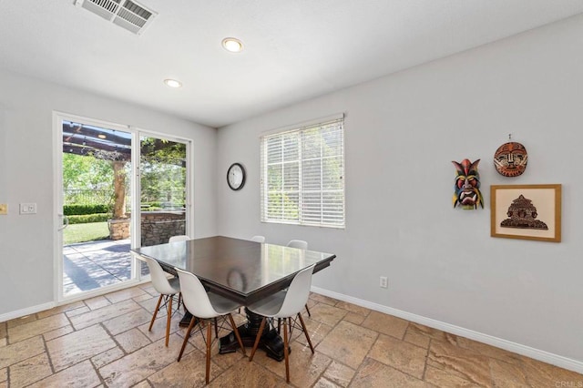 27792 Elderberry St, Murrieta, CA 92562 - dining area with stone tile floors and recessed lighting