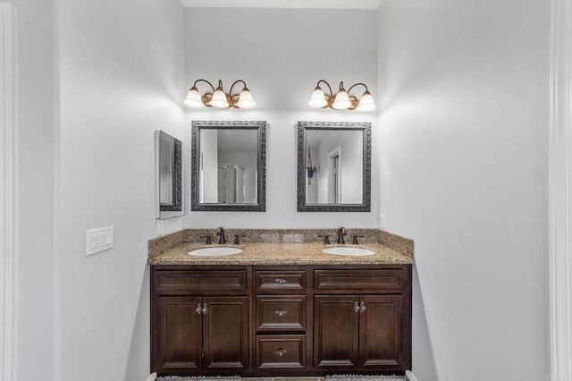 27792 Elderberry St, Murrieta, CA 92562 - bathroom with double vanity and baseboards