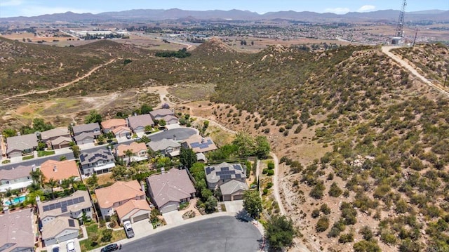 27792 Elderberry St, Murrieta, CA 92562 - aerial view of property and surrounding area featuring a mountain backdrop and nearby suburban area