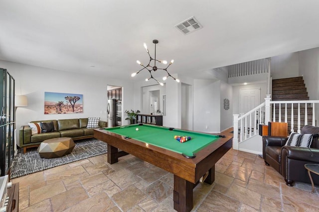 27792 Elderberry St, Murrieta, CA 92562 - rec room with stone tile floors, a chandelier, and billiards table