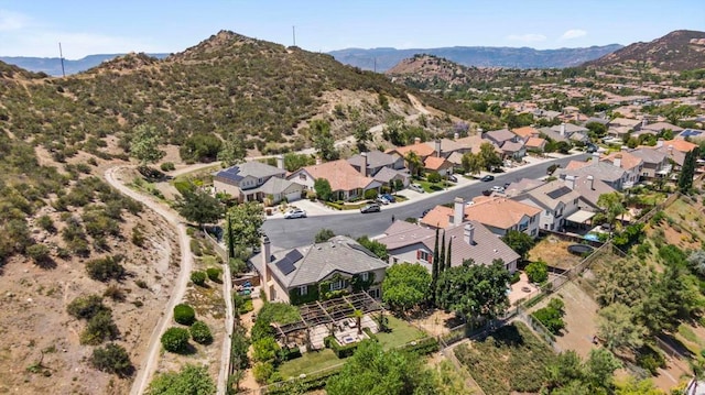 27792 Elderberry St, Murrieta, CA 92562 - aerial overview of property's location with a mountain backdrop and nearby suburban area