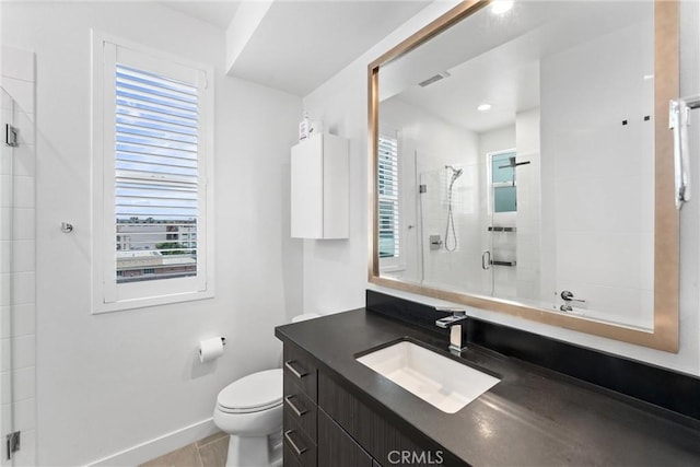 206 Alamo Ct, Long Beach, CA 90802 - bathroom with vanity, a shower stall, and tile patterned flooring
