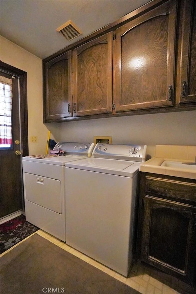 1200 Oxford Way, Hanford, CA 93230 - laundry room featuring cabinet space and independent washer and dryer