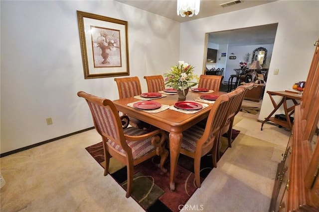 1200 Oxford Way, Hanford, CA 93230 - dining space featuring light carpet and a chandelier