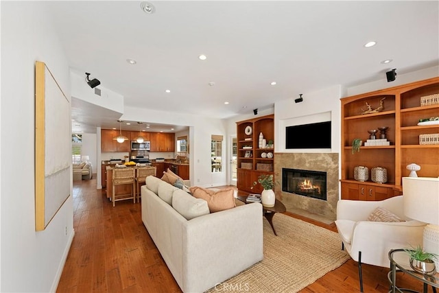 1114 Vincent St Unit A, Redondo Beach, CA 90277 - living area with a premium fireplace, recessed lighting, and wood finished floors