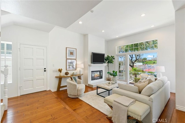1114 Vincent St Unit A, Redondo Beach, CA 90277 - living room with hardwood / wood-style floors, recessed lighting, and a glass covered fireplace