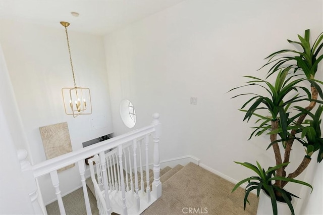 1114 Vincent St Unit A, Redondo Beach, CA 90277 - hallway with carpet, an upstairs landing, and a chandelier