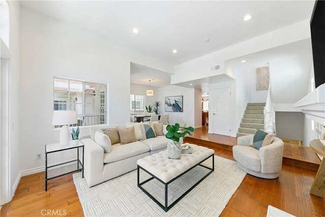 1114 Vincent St Unit A, Redondo Beach, CA 90277 - living room with light wood-style floors, recessed lighting, stairs, and a fireplace