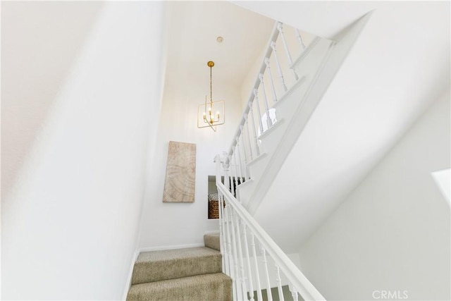 1114 Vincent St Unit A, Redondo Beach, CA 90277 - stairway featuring a chandelier and carpet
